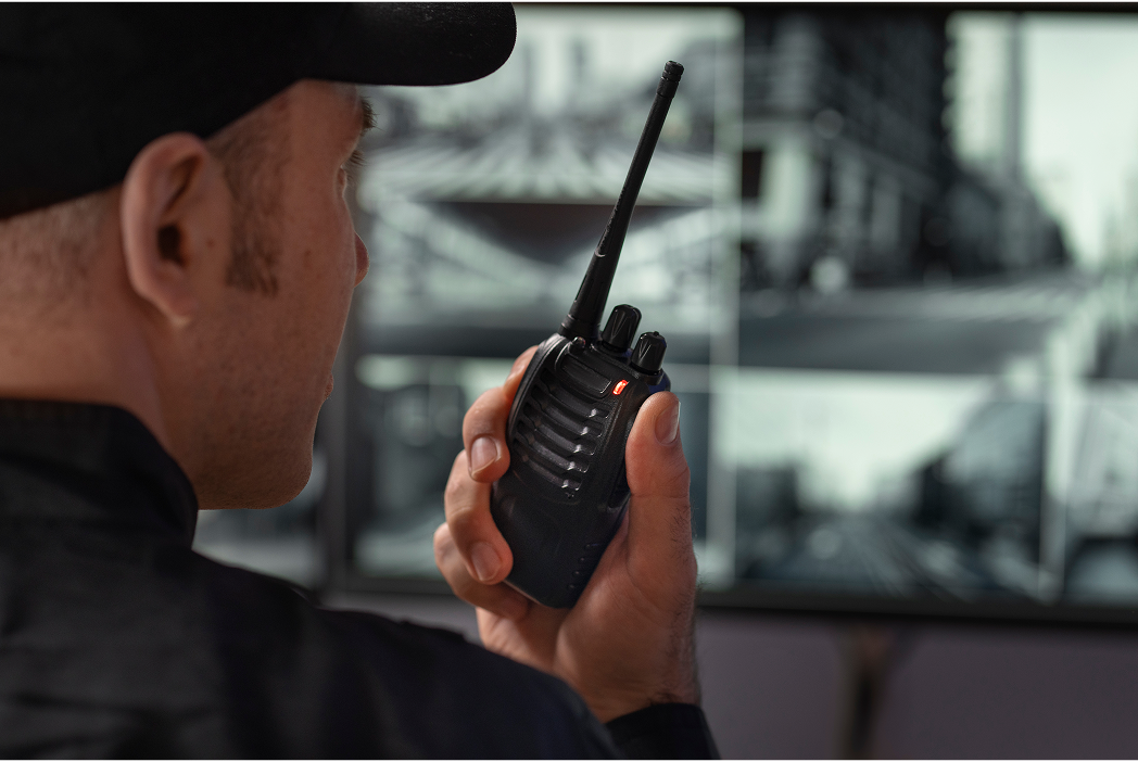 Security guard with walkie-talkie